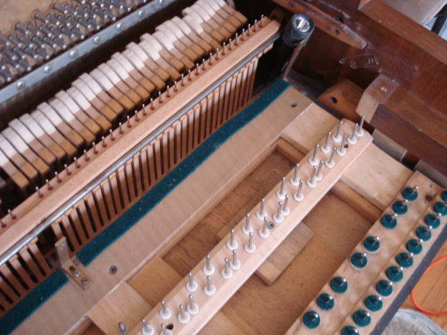 24 - Action re-installed in piano.